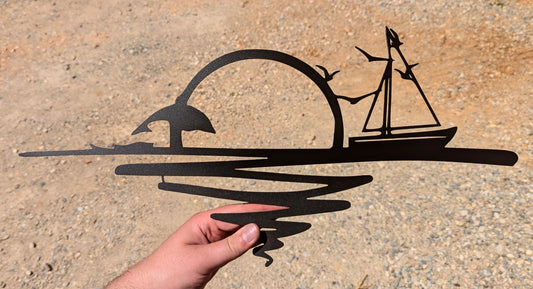 Décoration murale Soleil levant avec voilier, oiseaux et dauphin en métal